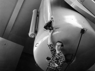 George Abell preparing to take plate with 48-inch Schmidt telescope